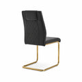 Silla de cuero sintético con estructura dorada